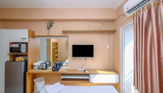 Fancy And Nice Studio (No Kitchen) At Green Pramuka City Apartment - Foto 5, Habitación