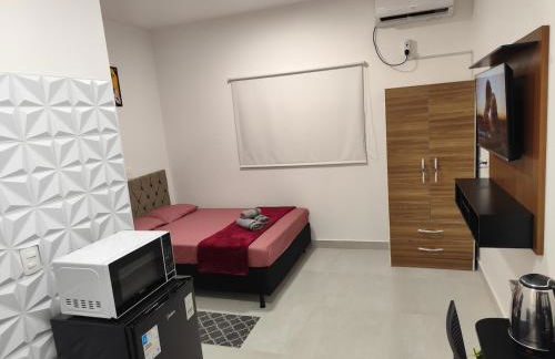 Studio Bem localizado, WIFI Rápido, Ar Condicionado e Estacionamento 1 - Photo 9