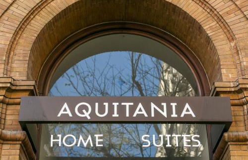 Aquitania Home Suites - Photo 19