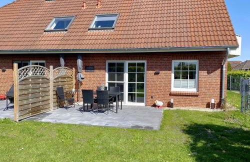 Nessmersiel, Renovierte Erdgeschosswohnung mit Garten, in Deichnähe, Wallbox, - Foto 12