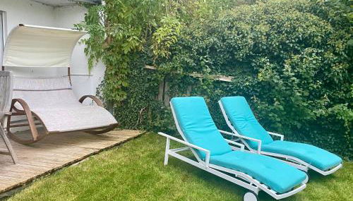 Gemütliche und voll ausgestatette 2 Zimmer Ferienwohnung am Wörthsee mit Terrasse, Grill, Schaukel, Doppelbett oder getrennte Betten fußläufig zu S-Bahn nach München und See, ideal zum Entspannen aber auch zum Arbeiten - Foto 5, Garden, sunbed