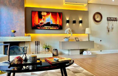 Lindo e aconchegante com lareira cond c/ piscina - Foto 3