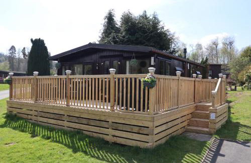 HEDDFAN, Luxury 3 bedroom timber lodge, Now with WiFi, Caer Beris Holiday Park, Builth Wells, SORRY NO TRADESMEN OR CONTRACTORS ALLOWED - Foto 1