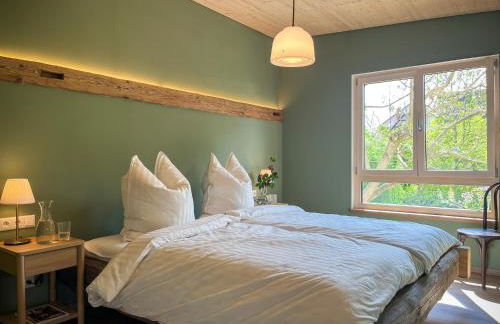 Amber Ferienhain - Ferienhaus 'Magnolie' mit verwunschenem Garten & privater Sauna - Foto 29