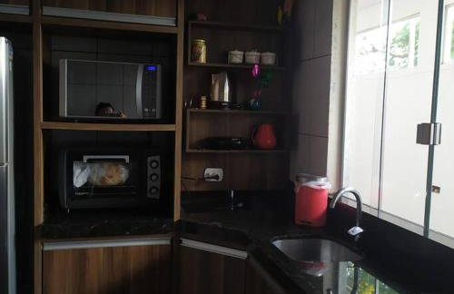 Casa Confortável arejada ar condicionado quente e frio 2 quartos ,2 banheiros ,2 vagas de garagem - Photo 10