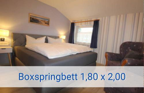 Böltser Hus Ferienwohnungen mit Strandkorb und Kamin 10 Gehminuten zum kurtaxefreien Sandstrand - Foto 5