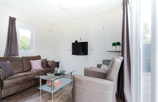 Chalet in Holiday Park With Private Terrace - Photo 3