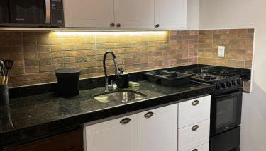 Solarium Riviera - Casa2 - NOVA 600m praia Riviera - Foto 3, stove