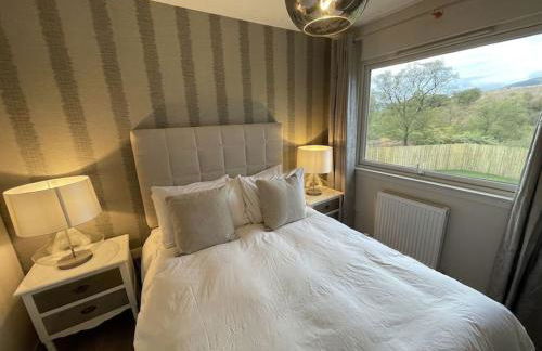 Hot tub lodge with stunning view - Foto 19