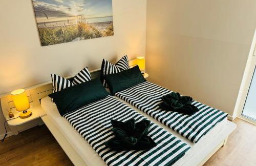 8 Personen Ferienhaus ,,Seegelblick" am Goitzschesee, erste Reihe am Strand mit Sauna, Whirlpool, Kamin, Wallbox & SUP - Foto 17