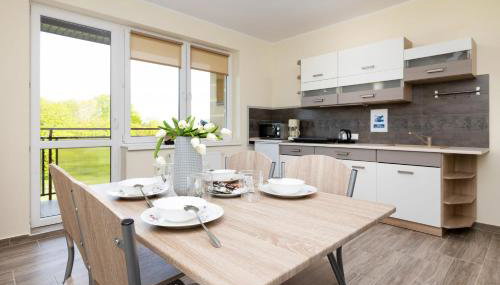 Peaceful Apartment Wrzosowo Bay with Parking by Noclegi Renters - Foto 3, stove