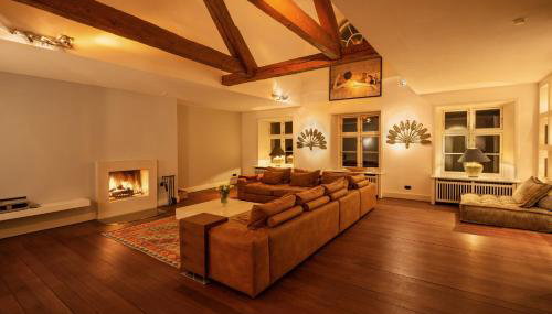 GUT KLETKAMP "Penthouse im Schloss" - Premium-Ferienwohnung mit 5 Schlafzimmern auf 400qm I Kamin I 2 Wohnzimmer I Garten & Terrasse I Wald- und Seeblick I Profi-Küche I 15 Min zur Ostsee I Parkplätze I WLAN - Foto 4