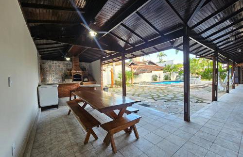 Casa Enorme para 12 pessoas, 4 suites e um fundo com 18mil metros de mata e um pier no rio que sai para o mar-Internet 100MB - Photo 7