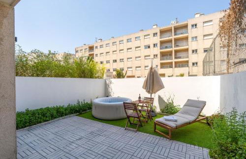 HostWise – Modern Flat w/ Terrace | Near the Beach - Photo 1