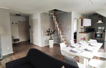 moderne Neubau-Wohnung mit Kamin und 35qm Dachterrasse - Foto 7