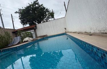 Casa Praia Grande 5min praia, 2 vagas, wi fi , 3 banheiros , piscina grande , freezer extra gelo , churrasqueira , até 9 pessoas - Photo 46