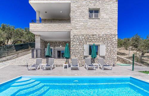 Elysian Stone Villa with Pool & Mountain View - Photo 1