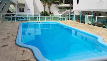 Casa nova com 3 quartos, equipada com Ar Condicionado, TV, Internet e Área de Lazer Completa - Boiçucanga - Foto 1