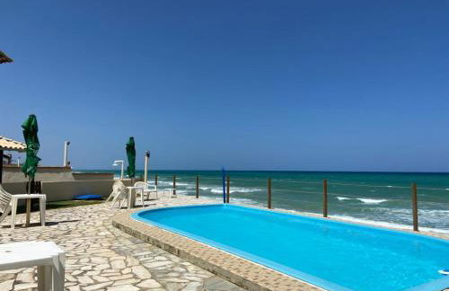 Casa de praia em condomínio à beira mar - Foto 1