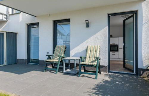 Modernes Apartment mit Terrasse & Garten, Parkplatz & 24h Self-Check-in - Foto 19