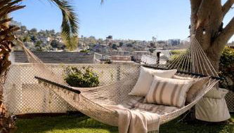 CasaViva Sky - 3BR 1BA Sleeps 10 - Rooftop City Views, Firepit & Bunk Room - Near Zoo & Beaches - Foto 3, Garden, Garden view