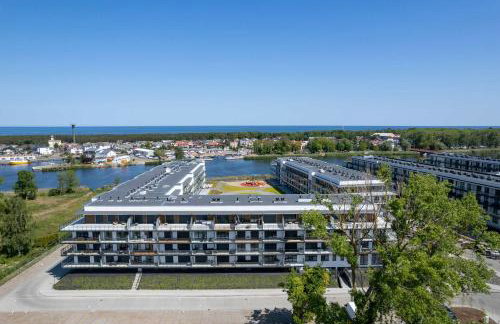 Bright Apartment Spadochroniarzy in Dziwnów with Parking & Pool by Noclegi Renters - Foto 35