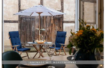 Apartment Leinetal mit Kamin & Kaminholz, 1-3 Personen , Schlafzimmer mit Boxspringbett 180x200 & hochwertige Hotelbettwäsche, bequemes Einzelbett im Wohnzimmer, Terrasse, Einbauküche, - Photo 11