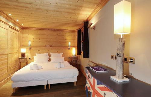 Chalet de 175m² à Courchevel Le Praz - Confort et Charme pour 10 Personnes - Sauna et Terrasse - FR-1-575-11 - Foto 10
