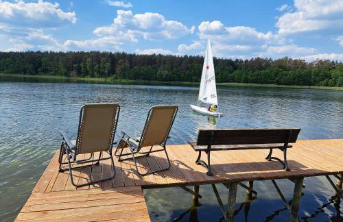 Domki przy jeziorze z prywatną plażą w Borach Tucholskich Pensjonat Alicja wczasy z dziećmi nowe luksusowe domki na skraju jeziora i lasu - Foto 47