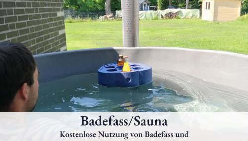 Familienfreundliche Ferienwohnung mit großem Garten, Spielplatz, privatem Badefass & Sauna - Foto 4, Garden view