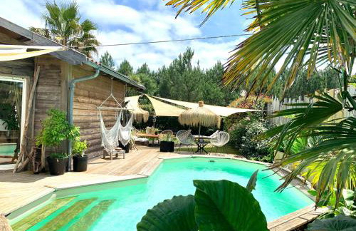 Maison ambiance cabane exotique climatisée piscine & spa 3 chambres 6 personnes - Photo 1