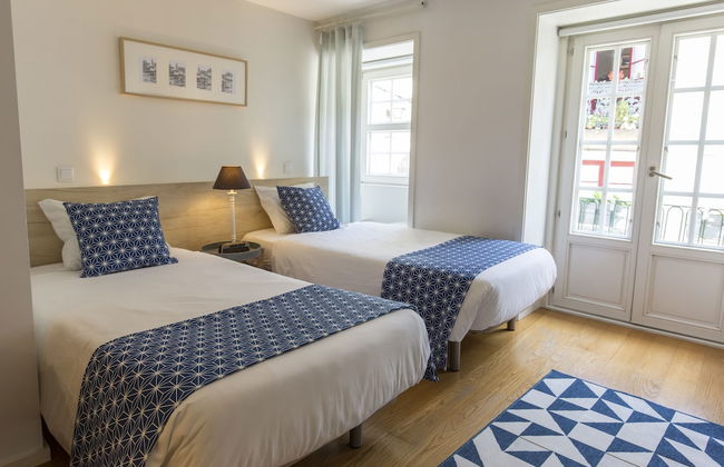 Bright 3BR Flat w/ AC in City Center by LovelyStay - Photo 15