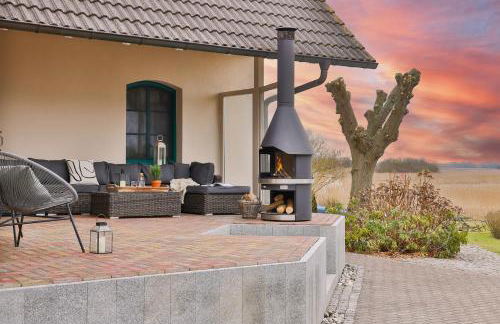 Boddenhuus - Traumhaus mit Steg und Boot - Foto 5