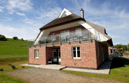 wassernahes Ferienhaus mit Meerblick und Schwimmbadnutzung in Sellin - Ferienhaus Rohrweihe - Foto 30