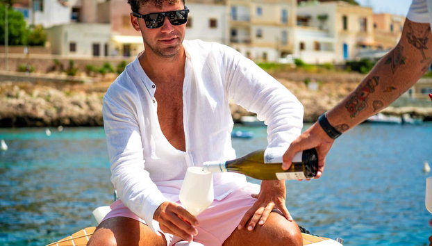 Boat Trip to Favignana - Photo 5, Toast with a glass of local wine on board