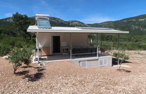 Robinson olive tree huts - Photo 2