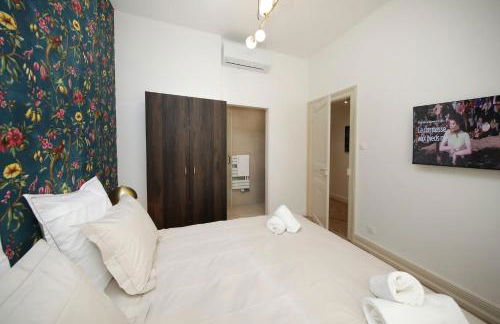 LE LYNX HAUSSMANIEN appartement tout confort, climatisé avec parking privé, à deux pas du centre - Foto 18