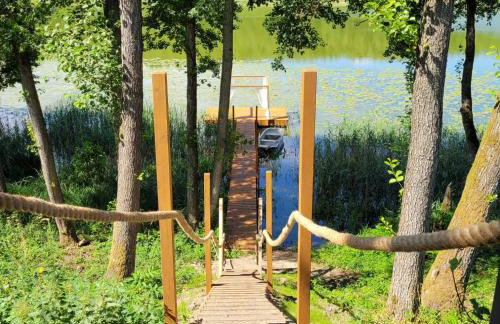 Leśna Kryjówka domki w lesie - Foto 23