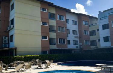 GUARAJUBA PARAÍSO DAS ÁGUAS - APT 2 quartos com AR e TV em TODOS os cômodos - Incluso Roupa de CAMA e BANHO - Filtro de Água Gelada e Maquina de Lavar dentro do APT - TOTAL CONFORTO PARA VC E SUA FAMILIA - Cond A beira da Lagoa e perto da PRAIA - Foto 8