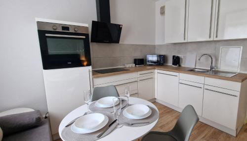 Zentrum Apartment - OLED TV - PS4 - Balkon - Parking - Foto 3, stove, toaster