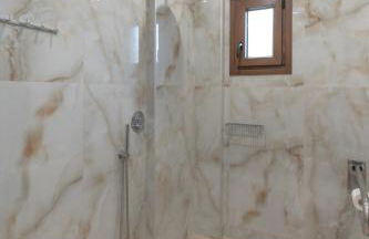 Sunshine Rooms and Suites - Foto 16