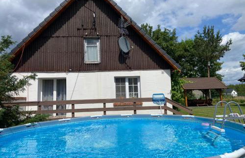 Domek nad jeziorem Bory Tucholskie las jeziora wakacje weekend Błądzim - Foto 15