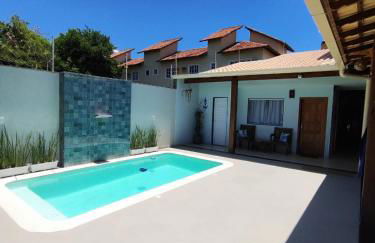 ESPAÇO PÉROLA GUANABARA, 70 Metros do Mar, 4 Suítes independentes COM AR, Área Gourmet Integrada com Piscina,Churrasqueira, 900 Metros de CASTELHANOS, ideal para FAMÍLIAS E AMIGOS - Foto 14