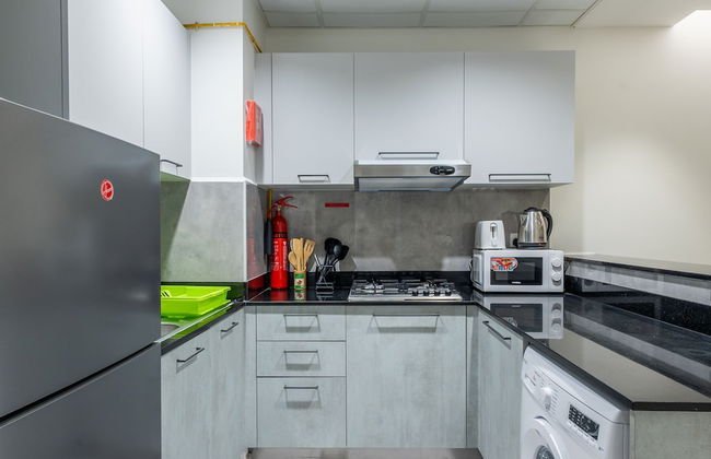 SuperHost - Comfort 1BR Centurion Onyx Retreat with Balcony - Foto 6