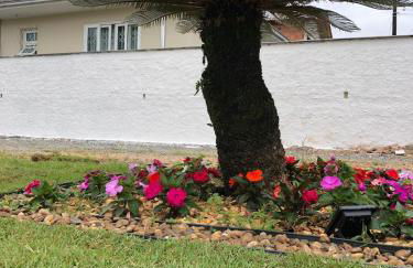 Casa Iririú · Casa exclusiva no terreno com jardim - Photo 22