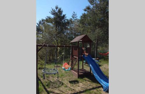 Drewniany domek nad jeziorem w Sitnie - Foto 12