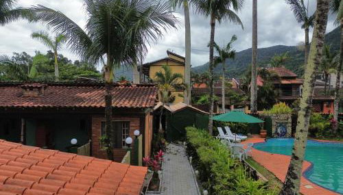 Lua Chalés 14 chalés equipados com churrasqueira individua , piscina e hidro incluindo café da manhã servido no quarto , roupa de cama, toalhas de banho e de praia a apenas 600 metros da praia de Maresias - Foto 3, Garden view