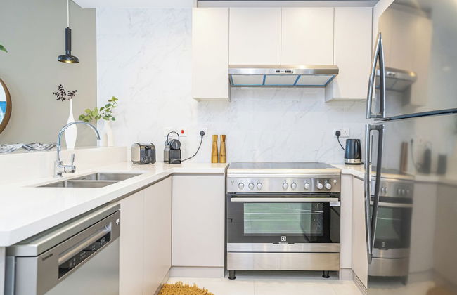 HomesGetaway-2BR Apt in 1 Residences - Photo 16