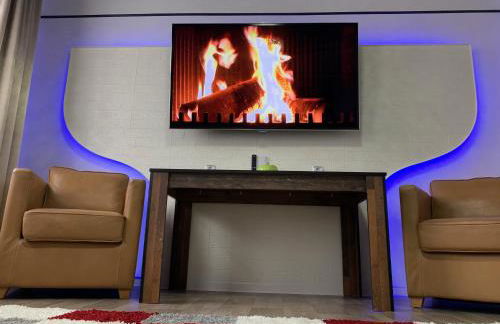 Best-Preis -Gold Suite- mit Netflix, Self-Check-In, eBike Ladestation, Fahrradraum, WLAN, Netflix und Massagesessel - direkt am Elberadweg im Herzen von Wittenberge - Foto 3