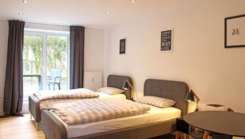 Moderne 1-Zimmer Wohnung mit Terasse, Küche, Bad mit Dusche, TV & WIFI - Foto 4